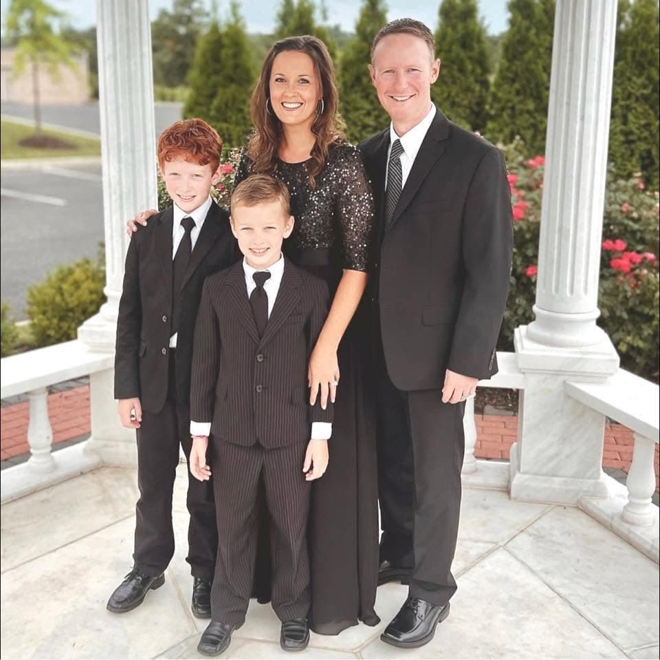 Pastor Tom Krampert with his wife Christy and their two sons